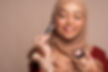 Woman Wearing Hijab and Applying Makeup.jpg